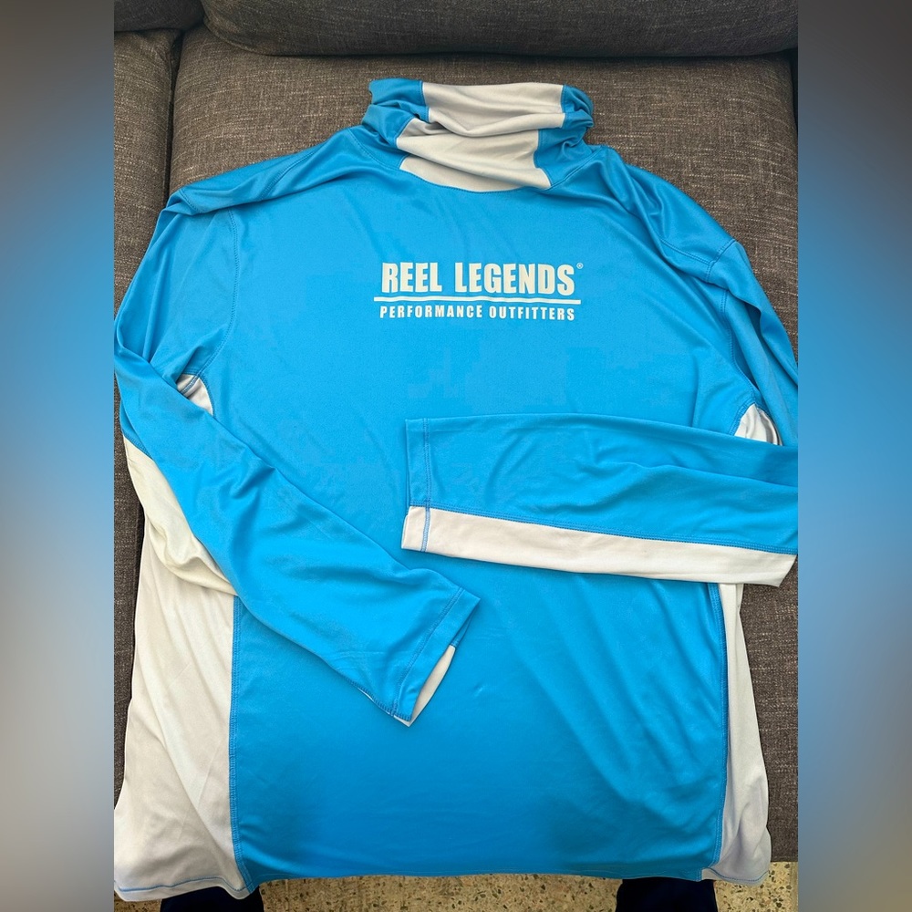 Men’s fishing shirt.  REEL Legends size XL, never worn tags still on.